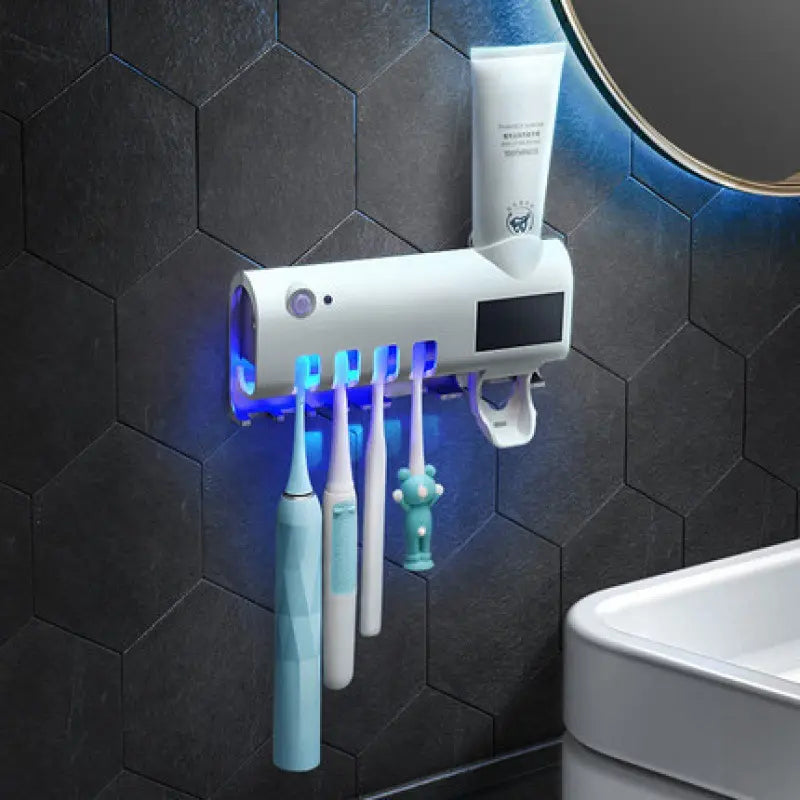 DISPENSADOR DE CREMA DENTAL Y ESTERILIZADOR DE CEPILLOS CON LUZ UV®